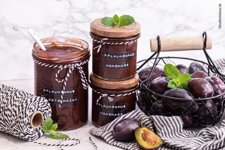 Three jars of grandma's plum jam from the oven without pectin