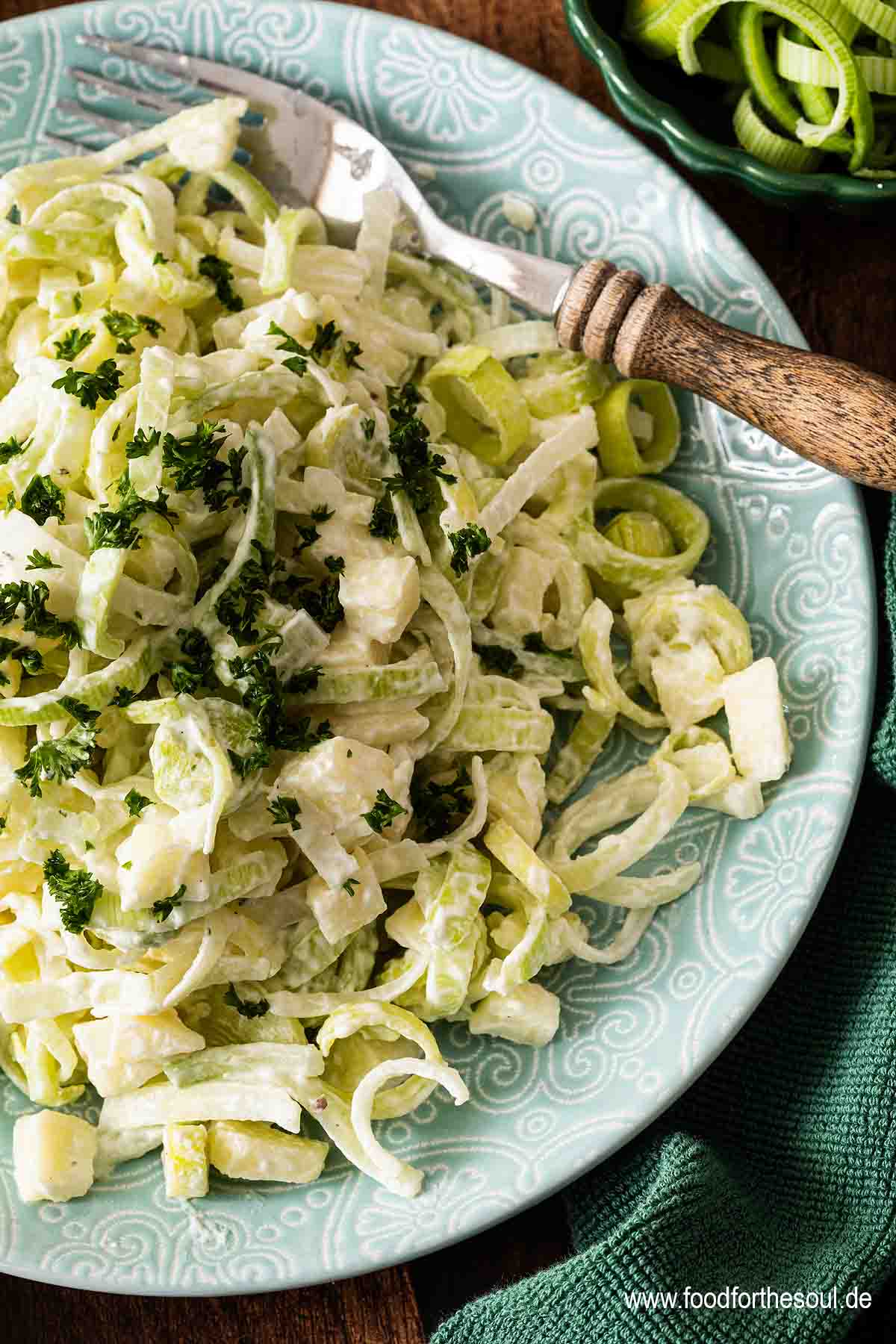 Raw Leek Salad with Apple on a plate