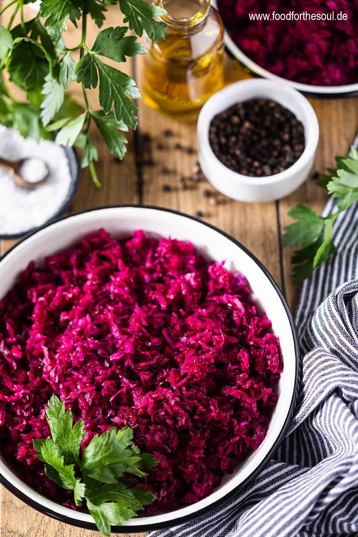German Red Cabbage Salad in a bowl garnished with parsley
