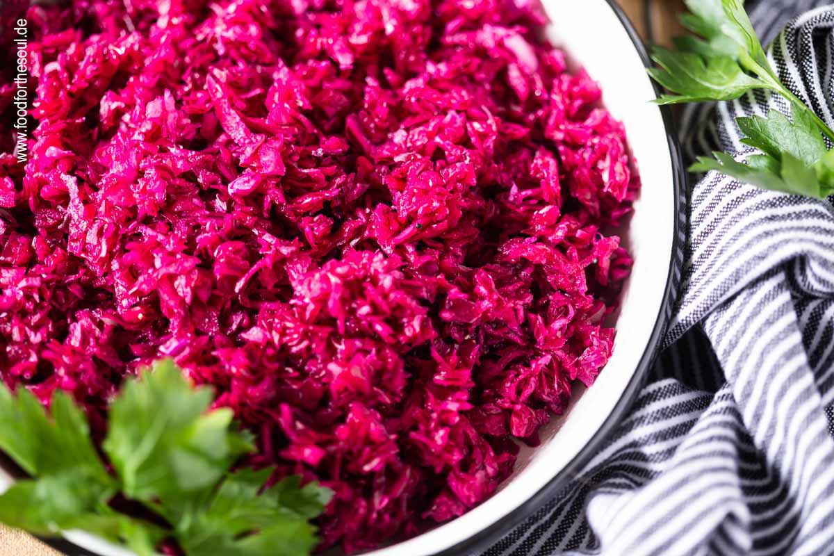 German Red Cabbage Salad in a bowl garnished with parsley